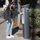 Customer using permit kiosk at Pavilion parking structure. 